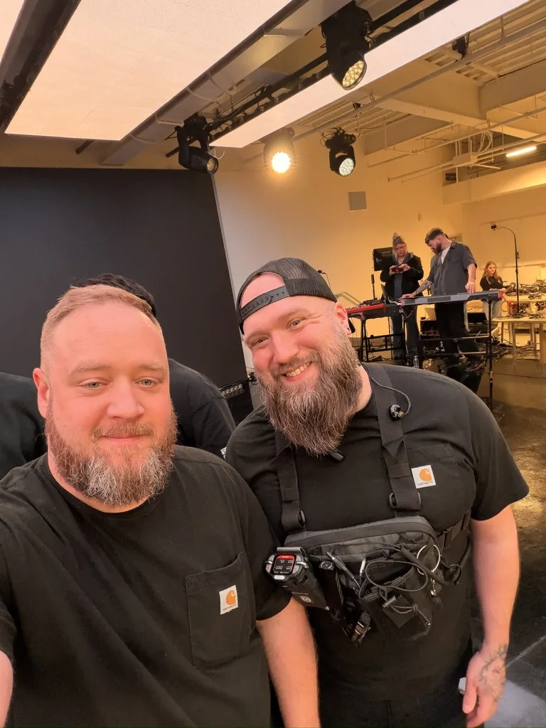 Jesse with a crew member during a studio session